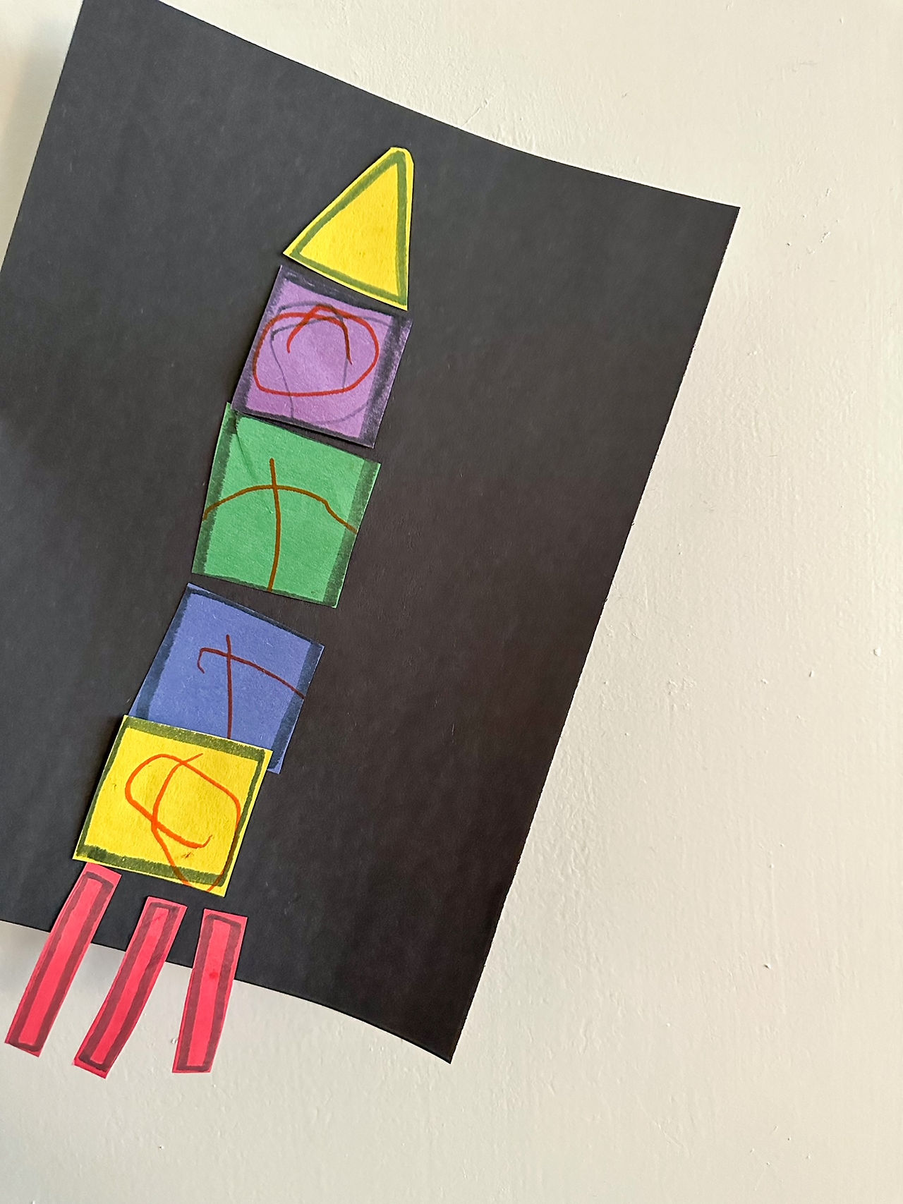child-made craft of a rocket ship with name Otto on it