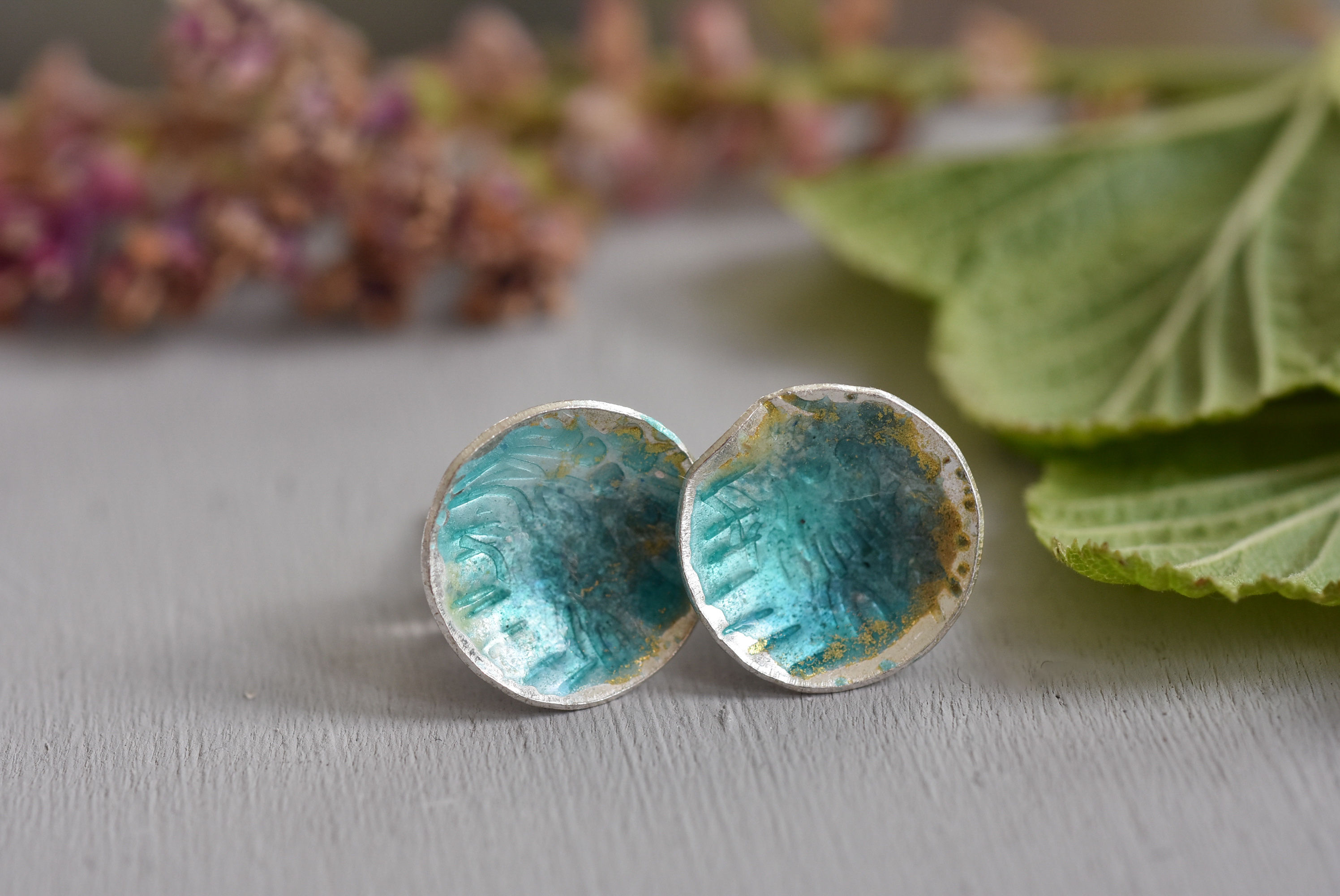 Blue green lined studs