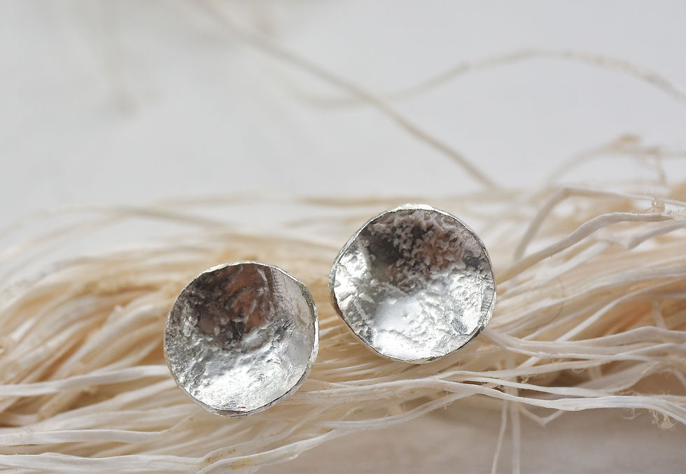 Thumbnail: Silver textured hand shaped studs