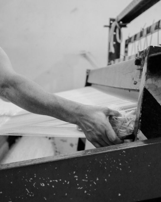 Handmade rug on wooden loom in Portugal