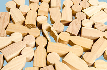 Wooden figurine of a man with an empty c