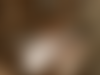 sustainable fabrics in hand with fabric manufacturing machine background