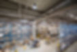 Air compressor parts warehouse with industrial shelving and inventory