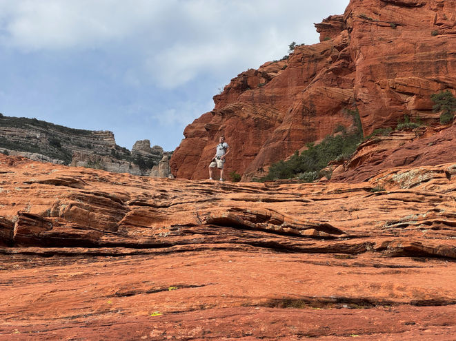 Layered red rock ledges and open canyon terrain off the Long Canyon Trail