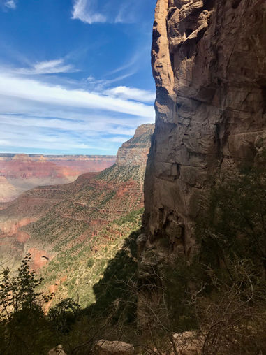 Bright Angel Trail winding through towering cliffs during the climb toward the South Rim.