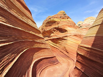 colorful sandstone cliffs and desert formations in Vermilion Cliffs National Monument