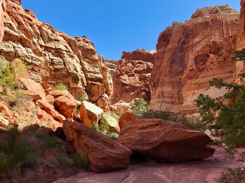Rocky wash and canyon entrance along Chimney Rock Trail approach
