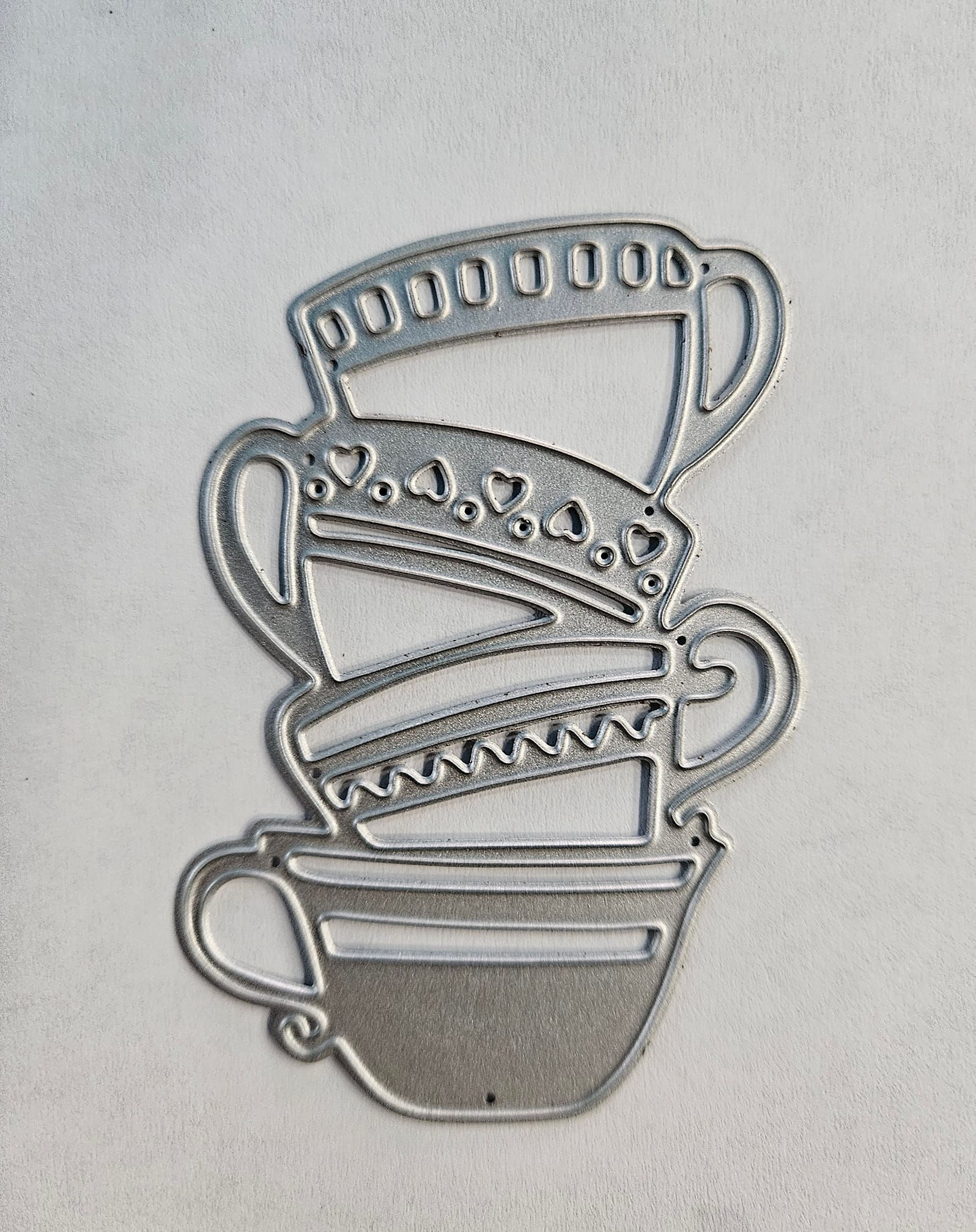 Teacup stack metal die
