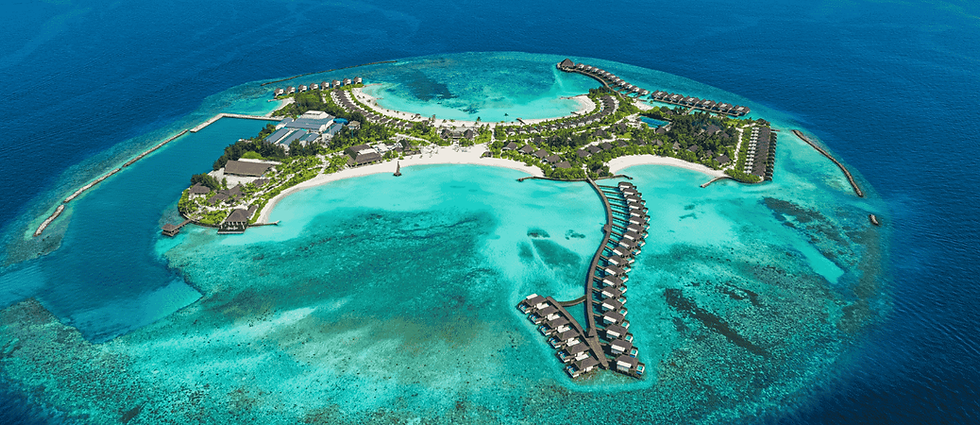 Dusit D2 Feydhoo Maldives, showing the resort island with overwater villas and clear turquoise water.