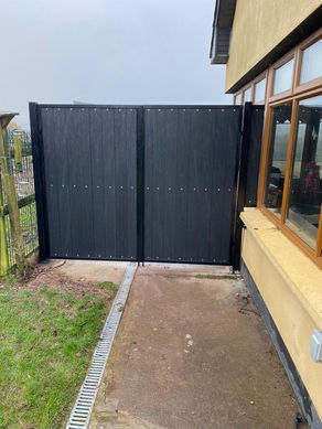 Grey double gate with black steel frame
