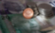 Hero image of Canadian and UK currency