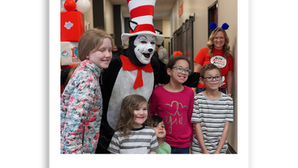 Students posing with the Cat in the Hat