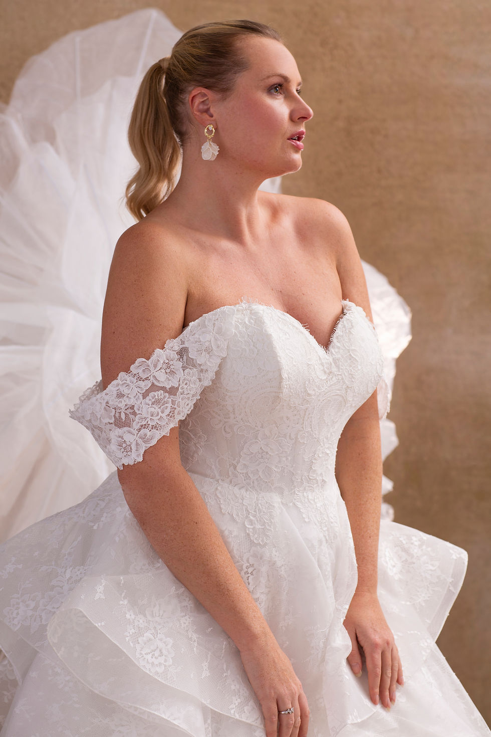 Detachable off the shoulder lace straps on the curvy White Rose Graceful Hailey WP793 gown
