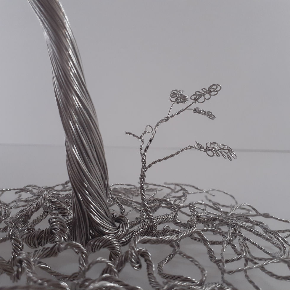 Thumbnail: Lullaby - stainless steel wire tree in the wind sculpture by CG Swanson close up of sapling
