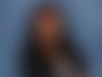 Portrait of Renee, an MLIS‑trained librarian and learning designer who supports students through mentorship and technology‑enabled learning