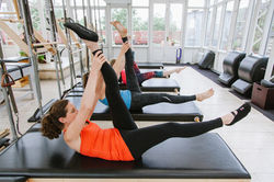 hamstring stretch pilates class