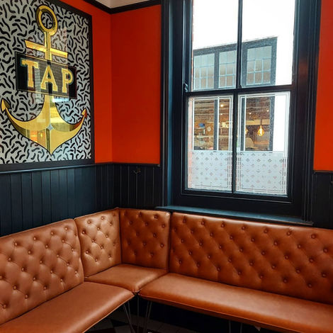 a room with a sign that says tap on it