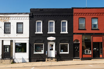 Exterior of downtown building and storefront in Columbus, Wisconsin, USA.