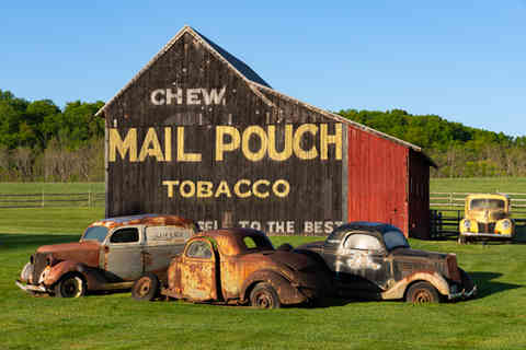 Perkiomenville, Pennsylvania - United States - April 27th, 2026: Vintage Mail Pouch Tobacco Barn at sunrise in Perkiomenville, Pennsylvania, USA. *FOR EDITORIAL USE ONLY