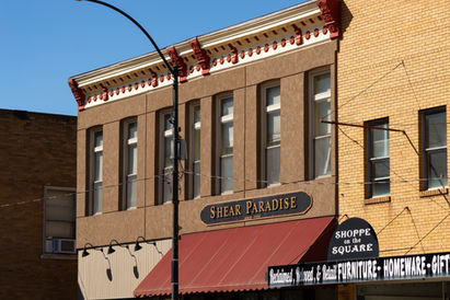 Exterior of downtown building and storefront in Clinton, Illinois, USA.