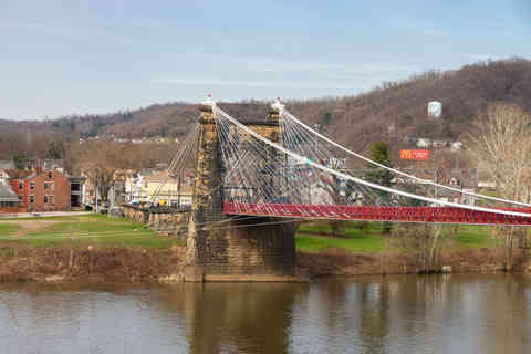 Wheeling, West Virginia - United States - March 25th, 2026: Historic Wheeling Suspension Bridge, built from 1847 to 1872, on the National Road over the Ohio River in Wheeling, West Virginia, USA.