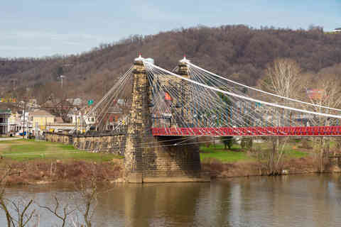 Wheeling, West Virginia - United States - March 25th, 2026: Historic Wheeling Suspension Bridge, built from 1847 to 1872, on the National Road over the Ohio River in Wheeling, West Virginia, USA.