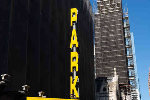 Yellow park sign in downtown Philadelphia, Pennsylvania, USA,
