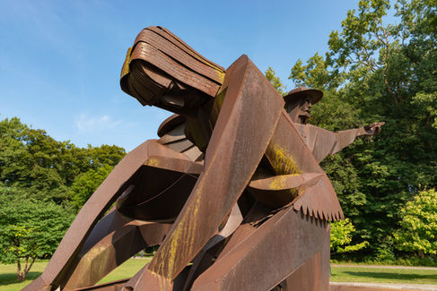 Sculpture at the Chicago Portage National Historic Site, depicting French explorers Father Marquette and Louis Joliet with Native American guide, on a beautiful Summer morning.
