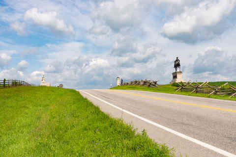 Looking West down a stretch of the historic Lincoln Highway through Gettysburg National Military Park in Gettysburg, Pennsylvania, USA.