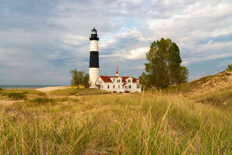 The historic Big Sable Point Lighthouse, built in 1867, with late afternoon lighting in Ludington, Michigan, USA.