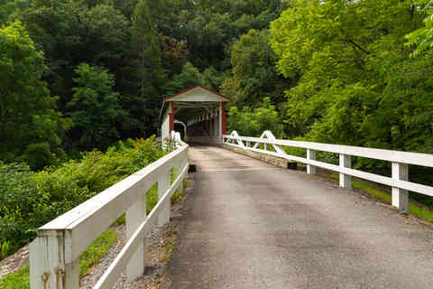 Breezewood, Pennsylvania - United States - August 25th, 2026: The Historic Jackson's Mill Covered Bridge, completed in 1889, in Breezewood, Pennsylvania, USA.