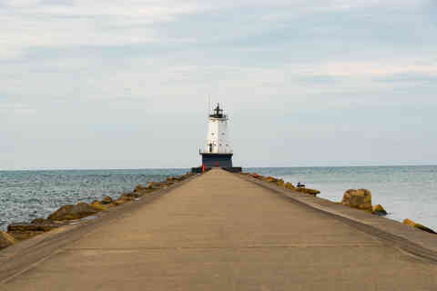 The historic Ludington North Breakwater Light, built in 1871, on a beautiful Fall morning in Ludington, Michigan, USA.