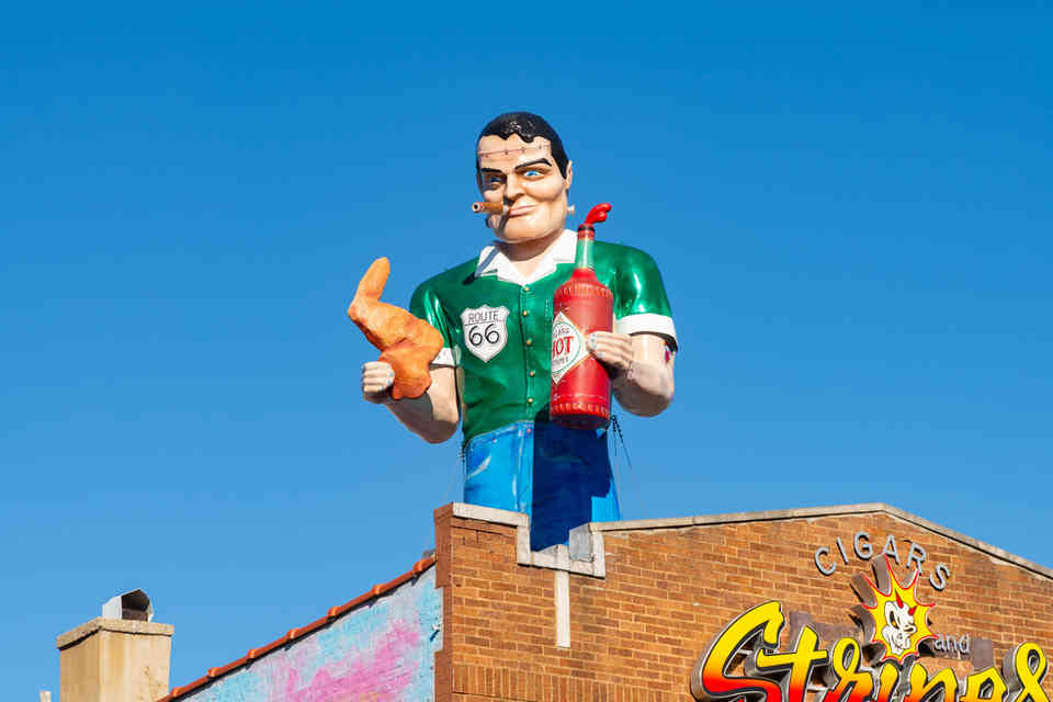 Berwyn, Illinois - United States - January 12th, 2025: The Cigars and Stripes Muffler Man on historic Route 66 in Berwyn, Illinois, USA. *FOR EDITORIAL USE ONLY