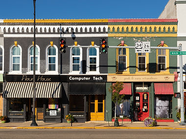 Old brick buildings and storefronts in downtown Princeton, Illinois.