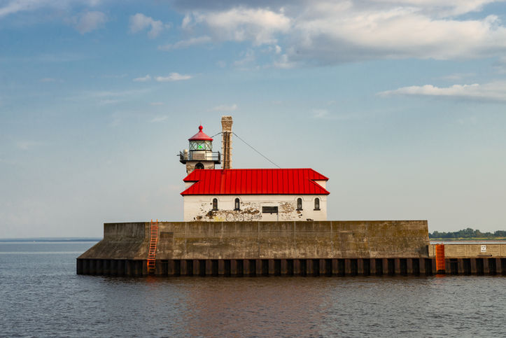The Duluth Harbor South Breakwater Outer Lighthouse, built in 1901, on a beautiful Summer afternoon in Duluth, Minnesota, USA.