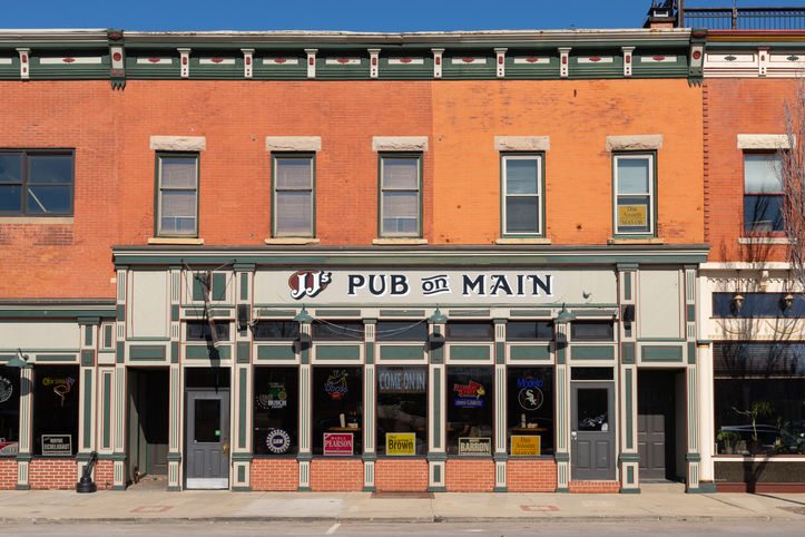 Exterior of old building and storefront in downtown Ottawa, Illinois.