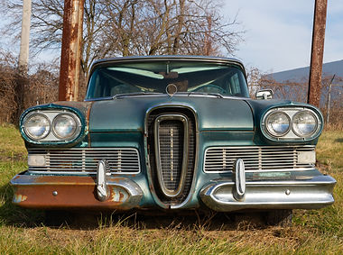Rusted classic car on historic Route 66 in Chenoa, Illinois, USA.