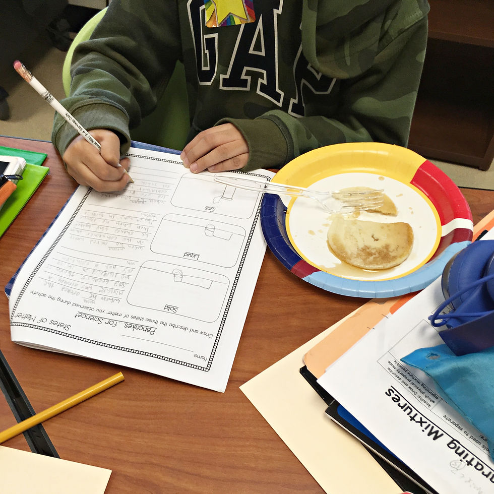 Kids completing pancake physical science review