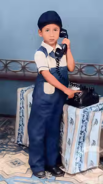 Expertly colourised mid century child portrait demonstrating advanced multi layer color reconstruction and full service photo preservation services | STYLOFUZE