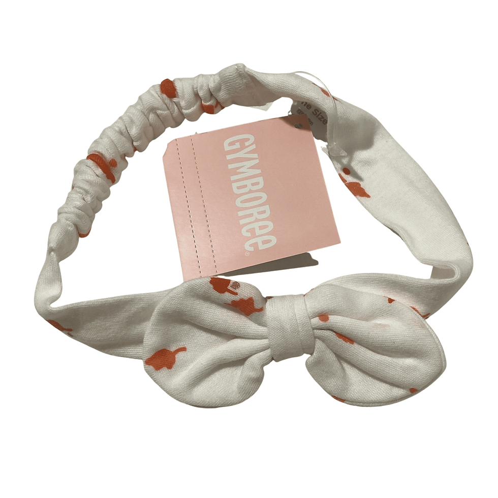 Front view of the Gymboree Happy Harvest Winter 2016 Girls Headband, featuring a white base with a bow detail.