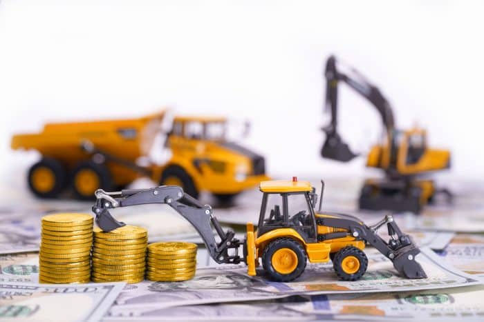 money-construction-equipment-finance-loan-dollars-toys-700x467.jpg