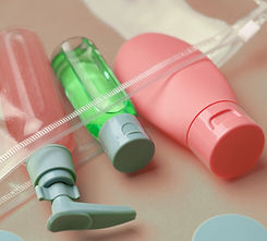 vecteezy_travel-size-bottles-and-containers-in-a-bag-on-a-yellow_52283762.jpg