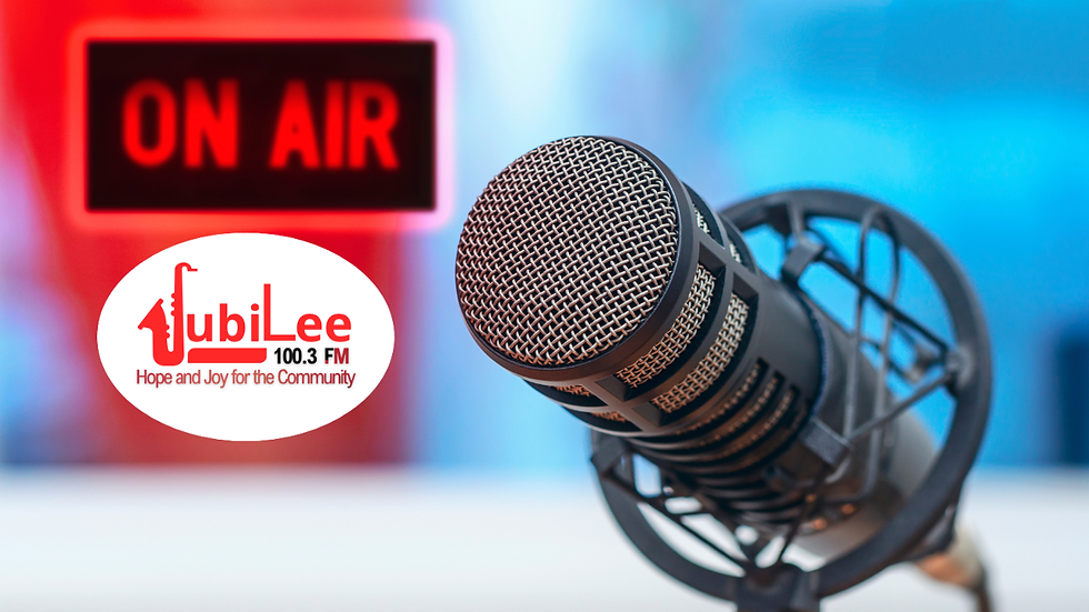 Jubilee 100.3 FM microphone with ON AIR sign