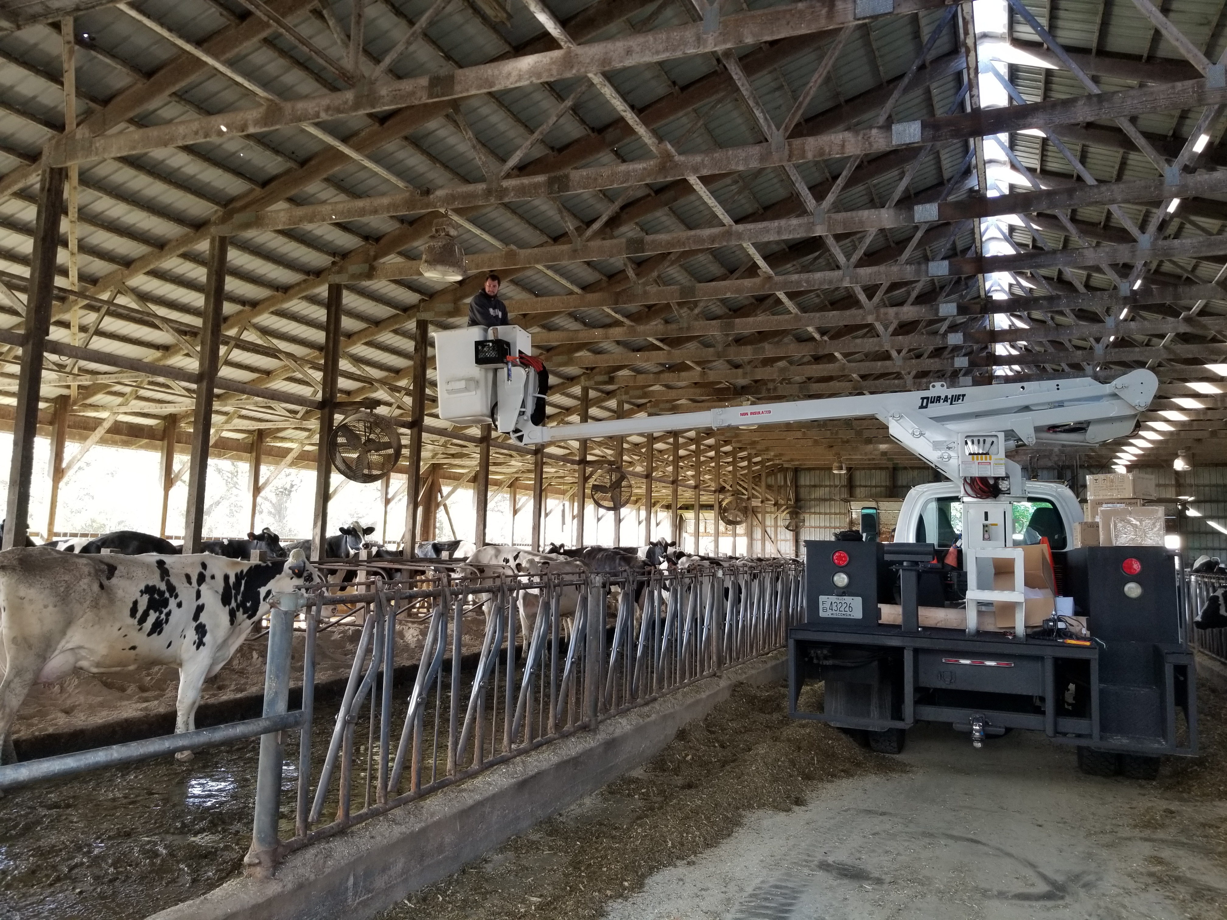 Boom truck dairy barn