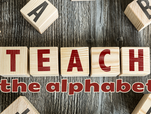 Alphabet blocks on a wood table