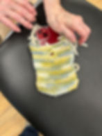 I love this knitted iPhone case, made by Joyce from the Yarmouth Senior Center.