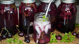 a traditional fruit drink made by gently cooking cherries in water to create a sweet, refreshing beverage.