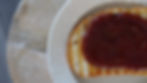 Honey Tomato Butter on a slice of bread.