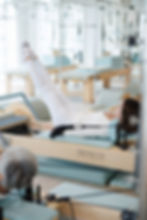 Shandy Aulia doing reformer pilates
