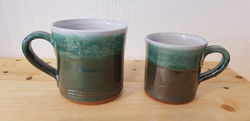 Large and small green and white mugs (10cm and 8cm) £10 and £8